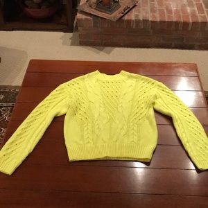 Bright yellow sweater